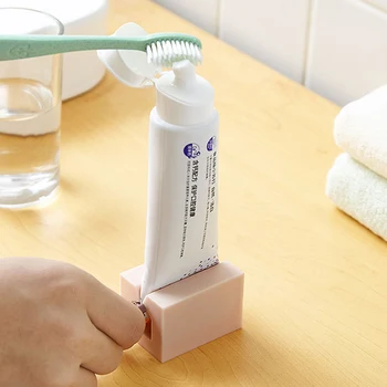 Kreative Tand Pasta Rør Squeezer Tandpasta Dispenser Holder Facial Cleanser Tube Rolling Klemme Badeværelse Tilbehør