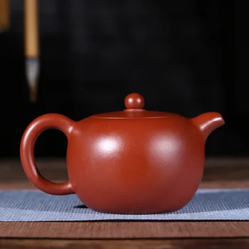 Tekande, er en gave til tepotter og tepotter lavet af lilla ler med runde perler i Dahongpao, en hånd-fremstillet af rå mine.