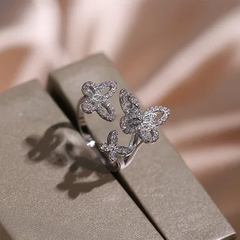 Sølv indlagt diamant butterfly hule sæt temperament skinner luksus damer høj smykker classic ladies smykker