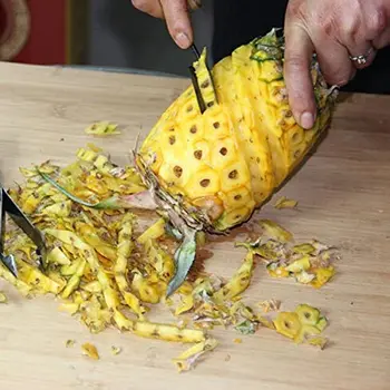 2-delt sæt med V-formet rustfrit stål ananas kniv peeler