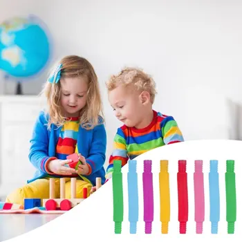 5pcs Farverige Plastic Pop Rør Spole Children' S Creative Circle Legetøj Tidlige Udvikling Uddannelsesmæssige Folde Toy Tilfældig Farve