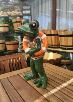 Urladan Have Frog Statue med Livet Bagel