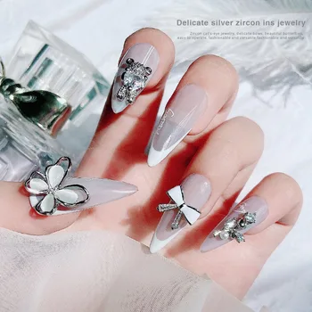 4-pc 'Nye søm cat' s eye butterfly tre-dimensionelle elsker at bære smykker bue luksus zircon negle dekoration diamant
